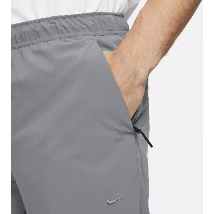 Мужские спортивные штаны Nike M Nk Df Unlimited Pant Tpr Smoke Grey/Black, s.M