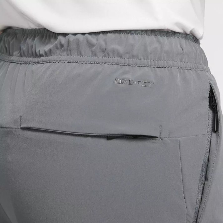 Pantaloni spotivi pentru bărbați Nike M Nk Df Unlimited Pant Tpr Smoke Grey/Black, s.M
