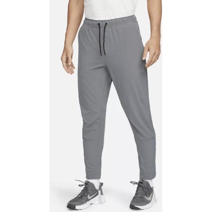 Мужские спортивные штаны Nike M Nk Df Unlimited Pant Tpr Smoke Grey/Black, s.XL