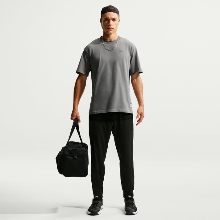 Pantaloni spotivi pentru bărbați Nike Primary NanoKnit Dri-FIT Black, s.M